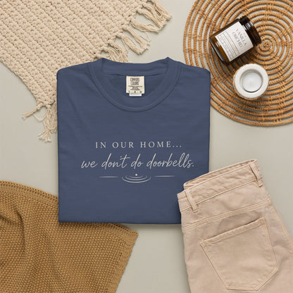 T-Shirt — "In Our Home We Don’t Do Doorbells" Minimalist Family Tee