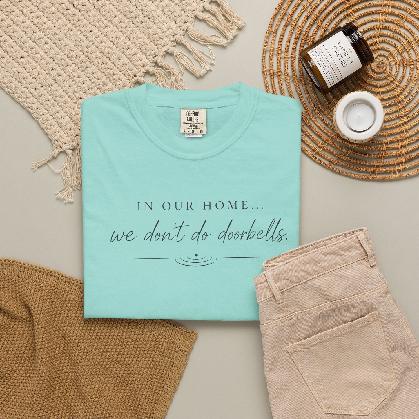T-Shirt — "In Our Home We Don’t Do Doorbells" Minimalist Family Tee