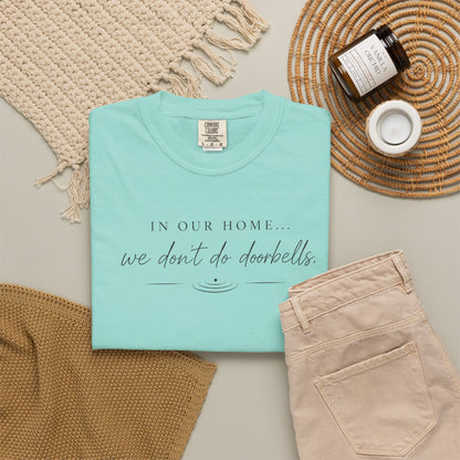 T-Shirt — "In Our Home We Don’t Do Doorbells" Minimalist Family Tee