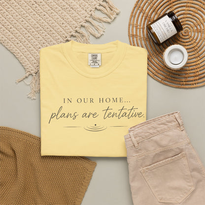 “In Our Home… Plans Are Tentative” Graphic T‑Shirt