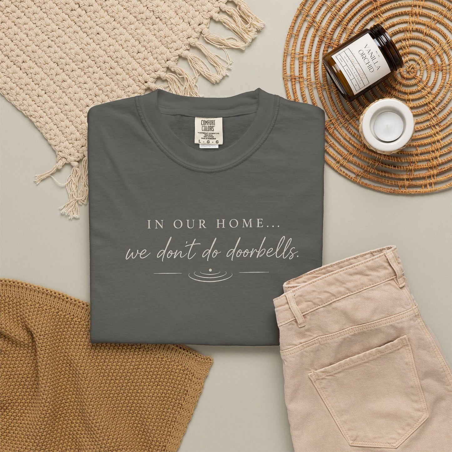 T-Shirt — "In Our Home We Don’t Do Doorbells" Minimalist Family Tee