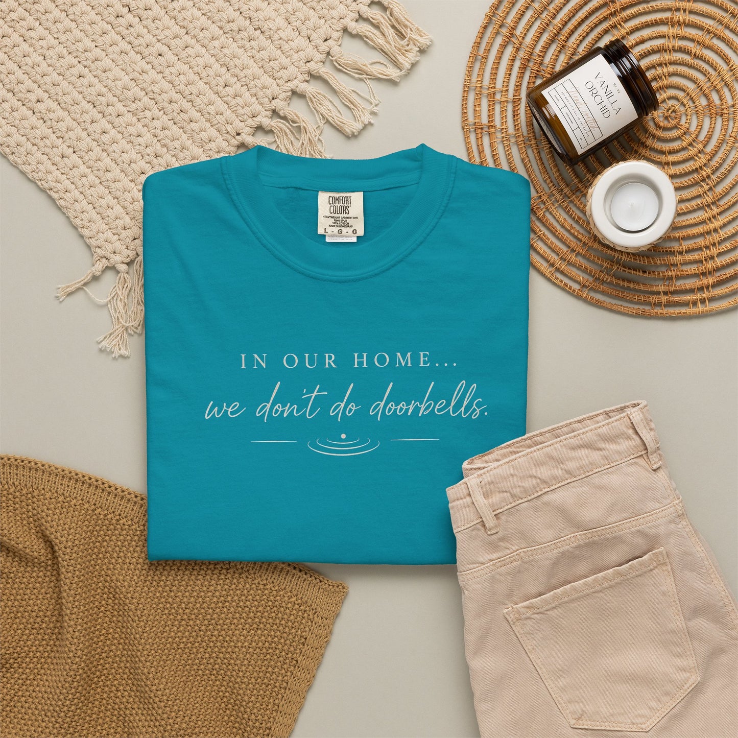 T-Shirt — "In Our Home We Don’t Do Doorbells" Minimalist Family Tee