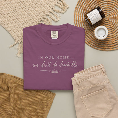 T-Shirt — "In Our Home We Don’t Do Doorbells" Minimalist Family Tee