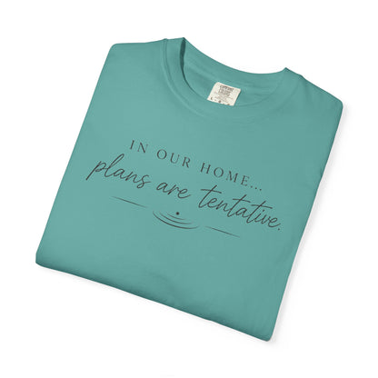 “In Our Home… Plans Are Tentative” Graphic T‑Shirt